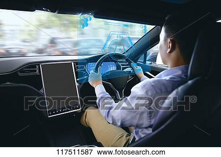 Japanese man in self driving car View Large Photo Image Stock Photo - Japanese man in self driving car. Fotosearch
