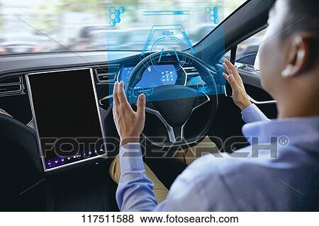 Japanese man in self driving car View Large Photo Image Stock Photo - Japanese man in self driving car. Fotosearch