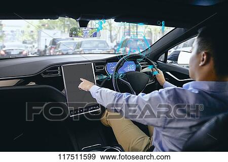 Japanese man in self driving car View Large Photo Image Stock Photo - Japanese man in self driving car. Fotosearch