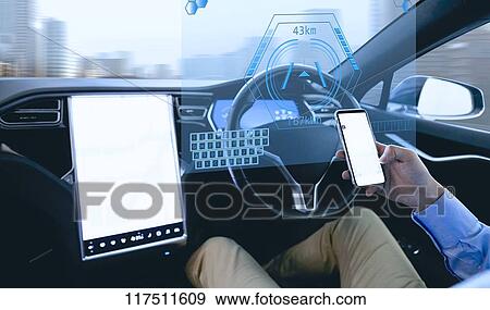 Japanese man in self driving car View Large Photo Image Stock Photo - Japanese man in self driving car. Fotosearch