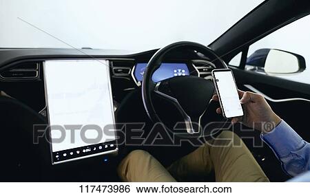 Japanese man in self driving car View Large Photo Image Stock Photograph - Japanese man in self driving car. Fotosearch