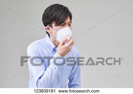 Japanese man wearing mask View Large Photo Image Stock Image - Japanese man wearing mask. Fotosearch