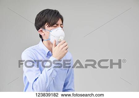 Japanese man wearing mask View Large Photo Image Stock Image - Japanese man wearing mask. Fotosearch
