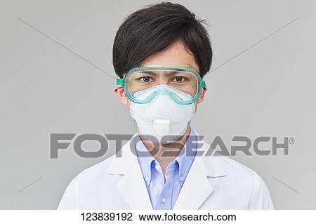 Japanese man wearing mask View Large Photo Image Stock Image - Japanese man wearing mask. Fotosearch