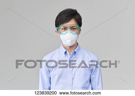 Japanese man wearing mask View Large Photo Image Stock Image - Japanese man wearing mask. Fotosearch