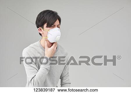 Japanese man wearing mask View Large Photo Image Stock Photo - Japanese man wearing mask. Fotosearch
