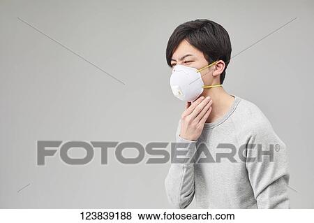 Japanese man wearing mask View Large Photo Image Stock Photo - Japanese man wearing mask. Fotosearch