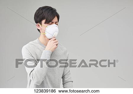 Japanese man wearing mask View Large Photo Image Stock Photograph - Japanese man wearing mask. Fotosearch