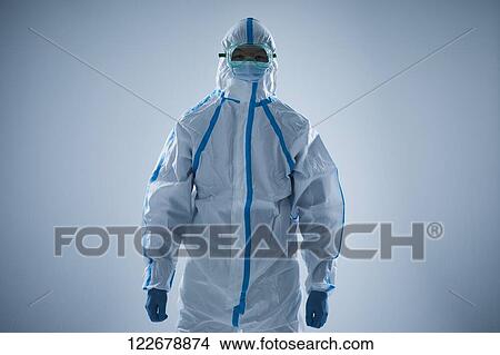 Japanese man wearing protective suit for disease prevention View Large Photo Image Picture - Japanese man wearing protective suit for disease prevention. Fotosearch