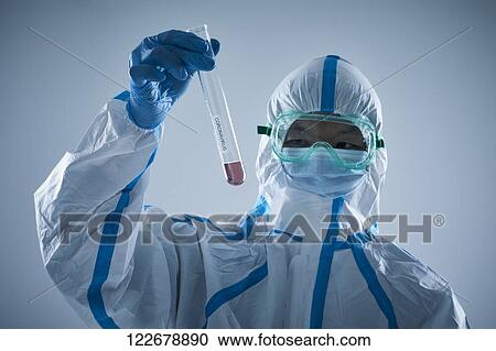 Japanese man wearing protective suit for disease prevention View Large Photo Image Stock Image - Japanese man wearing protective suit for disease prevention. Fotosearch