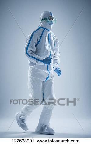 Japanese man wearing protective suit for disease prevention View Large Photo Image Stock Image - Japanese man wearing protective suit for disease prevention. Fotosearch