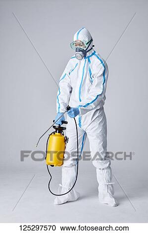 Japanese man wearing protective suit for disease prevention View Large Photo Image Stock Image - Japanese man wearing protective suit for disease prevention. Fotosearch