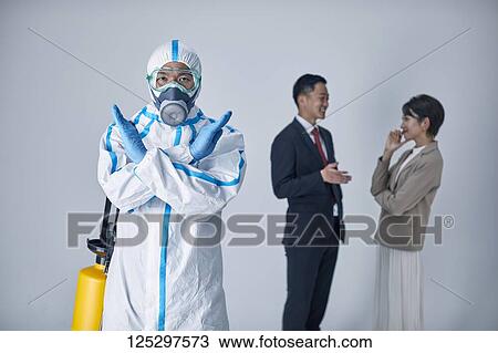 Japanese man wearing protective suit for disease prevention View Large Photo Image Stock Image - Japanese man wearing protective suit for disease prevention. Fotosearch