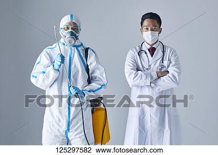 Japanese man wearing protective suit and doctor View Large Photo Image Stock Image - Japanese man wearing protective suit and doctor. Fotosearch