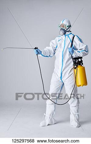 Japanese man wearing protective suit for disease prevention View Large Photo Image Stock Photo - Japanese man wearing protective suit for disease prevention. Fotosearch