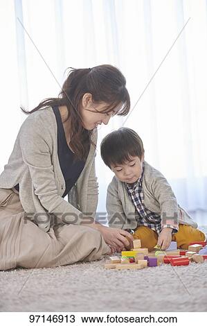 Stock Image - Japanese mother and kid. Fotosearch