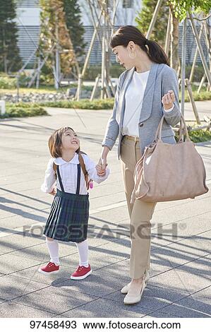 Stock Image - Japanese mother and kid. Fotosearch
