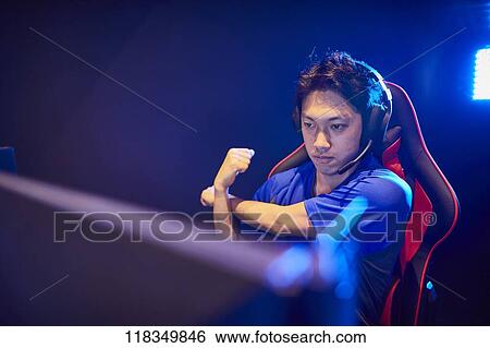 Stock Photograph - Japanese professional gamer. Fotosearch