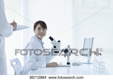 Japanese researchers in the lab View Large Photo Image Picture - Japanese researchers in the lab. Fotosearch