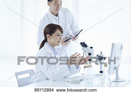 Japanese researchers in the lab View Large Photo Image Picture - Japanese researchers in the lab. Fotosearch