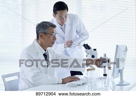 Japanese researchers in the lab View Large Photo Image Picture - Japanese researchers in the lab. Fotosearch