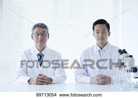 Japanese researchers in the lab View Large Photo Image Picture - Japanese researchers in the lab. Fotosearch
