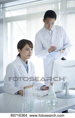 Japanese researchers in the lab View Large Photo Image Picture - Japanese researchers in the lab. Fotosearch