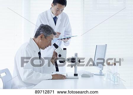 Japanese researchers in the lab View Large Photo Image Stock Image - Japanese researchers in the lab. Fotosearch