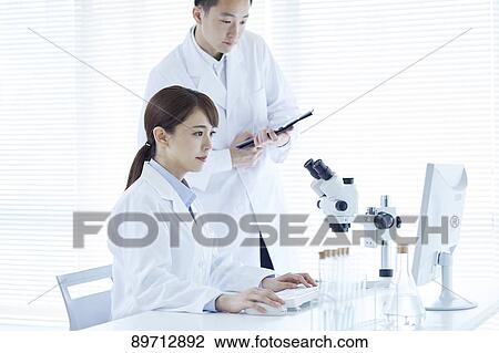 Japanese researchers in the lab View Large Photo Image Stock Image - Japanese researchers in the lab. Fotosearch