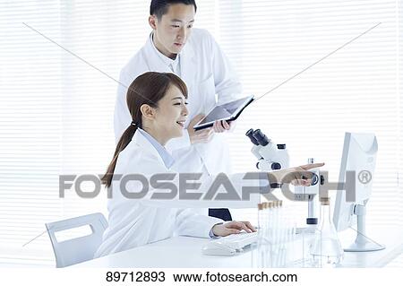 Japanese researchers in the lab View Large Photo Image Stock Image - Japanese researchers in the lab. Fotosearch