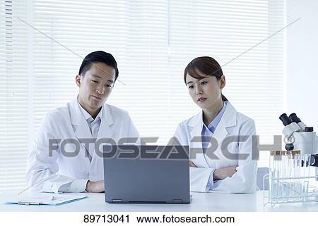 Japanese researchers in the lab View Large Photo Image Stock Image - Japanese researchers in the lab. Fotosearch
