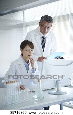 Japanese researchers in the lab View Large Photo Image Stock Image - Japanese researchers in the lab. Fotosearch