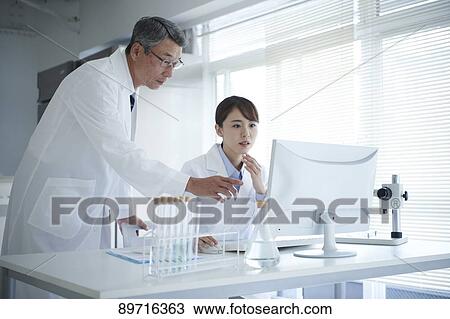 Japanese researchers in the lab View Large Photo Image Stock Image - Japanese researchers in the lab. Fotosearch