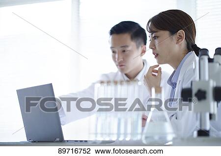 Japanese researchers in the lab View Large Photo Image Stock Image - Japanese researchers in the lab. Fotosearch
