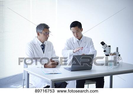 Japanese researchers in the lab View Large Photo Image Stock Image - Japanese researchers in the lab. Fotosearch