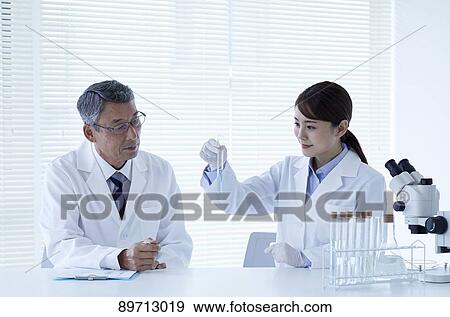 Japanese researchers in the lab View Large Photo Image Stock Photo - Japanese researchers in the lab. Fotosearch