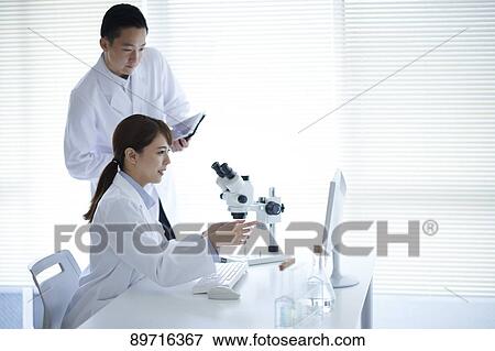Japanese researchers in the lab View Large Photo Image Stock Photo - Japanese researchers in the lab. Fotosearch