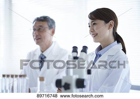 Japanese researchers in the lab View Large Photo Image Stock Photo - Japanese researchers in the lab. Fotosearch