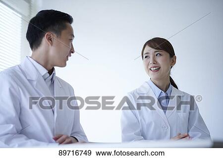 Japanese researchers in the lab View Large Photo Image Stock Photo - Japanese researchers in the lab. Fotosearch