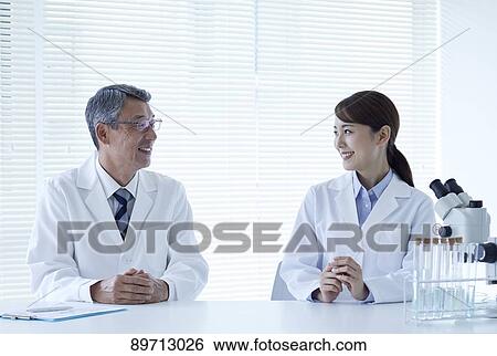 Japanese researchers in the lab View Large Photo Image Stock Photograph - Japanese researchers in the lab. Fotosearch