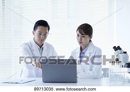 Japanese researchers in the lab View Large Photo Image Stock Photography - Japanese researchers in the lab. Fotosearch