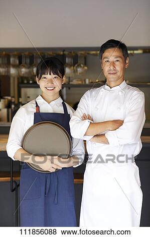 Stock Photo - Japanese restaurant staff. Fotosearch