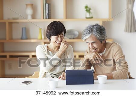 Stock Image - Japanese senior couple. Fotosearch