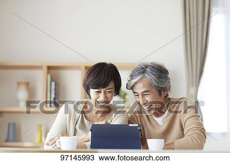 Stock Image - Japanese senior couple. Fotosearch