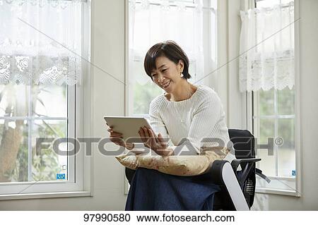 Japanese senior woman on electric wheelchair View Large Photo Image Stock Image - Japanese senior woman on electric wheelchair. Fotosearch
