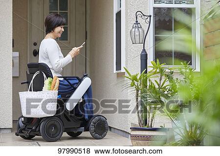 Japanese senior woman on electric wheelchair View Large Photo Image Stock Photo - Japanese senior woman on electric wheelchair. Fotosearch