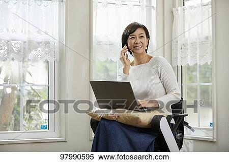 Japanese senior woman on electric wheelchair View Large Photo Image Stock Photography - Japanese senior woman on electric wheelchair. Fotosearch