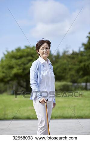 Stock Image - Japanese senior woman. Fotosearch