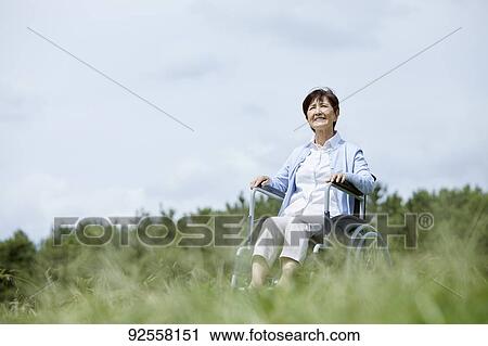 Stock Image - Japanese senior woman. Fotosearch
