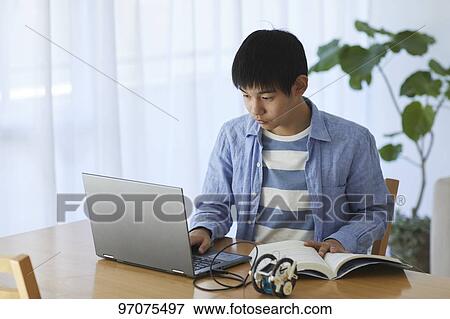 Japanese teenager studying programming View Large Photo Image Stock Photo - Japanese teenager studying programming. Fotosearch